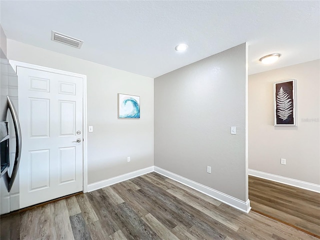 entrance foyer featuring hardwood / wood-style floors