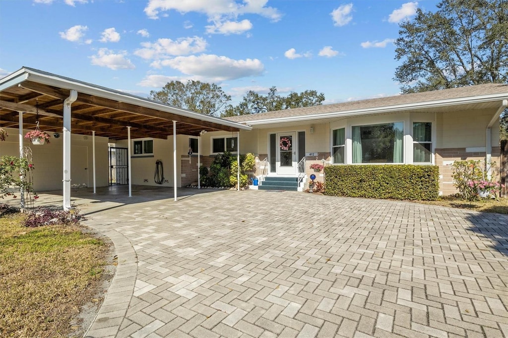 exterior space featuring a carport