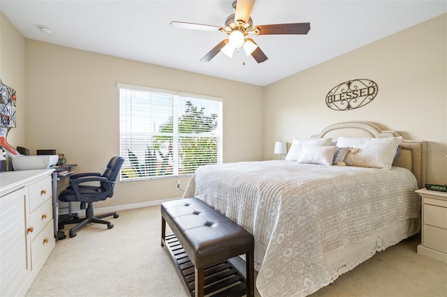 bedroom with light colored carpet and ceiling fan