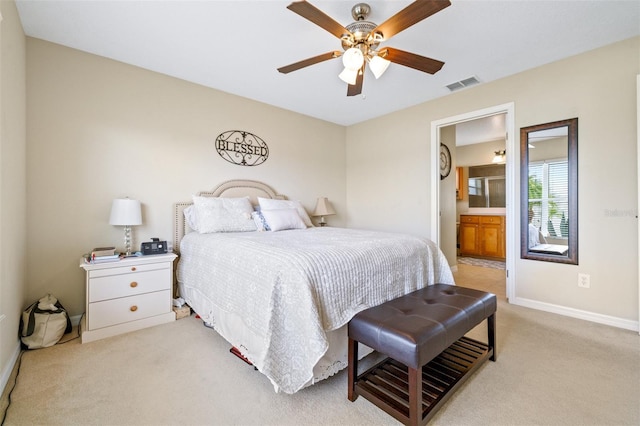 carpeted bedroom featuring connected bathroom and ceiling fan