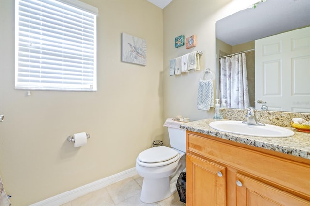 bathroom with a shower with curtain, tile patterned floors, toilet, and vanity