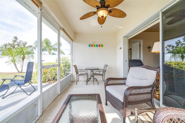 sunroom / solarium with ceiling fan