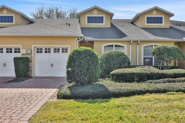 view of front of property with a garage