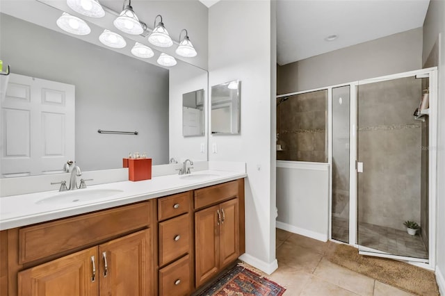 bathroom featuring walk in shower, vanity, toilet, and tile patterned flooring