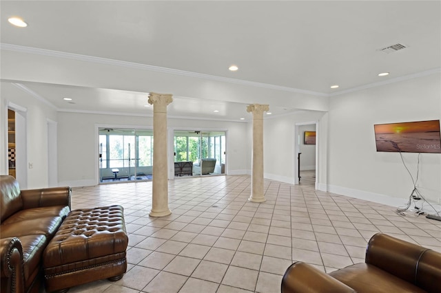 tiled living room with ornamental molding and ornate columns