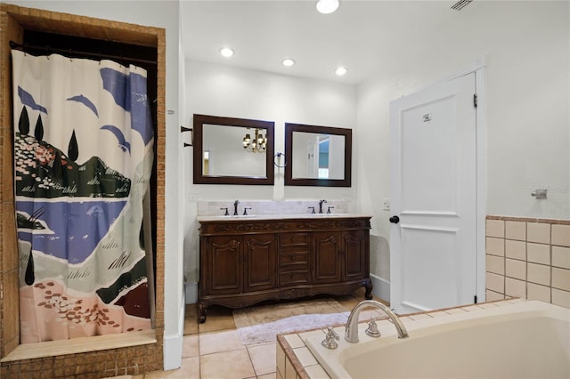 bathroom with vanity, tile patterned floors, and independent shower and bath