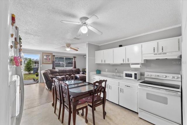 kitchen with sink, white cabinets, ornamental molding, white appliances, and a textured ceiling