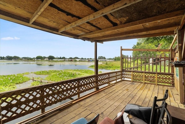 deck featuring a water view