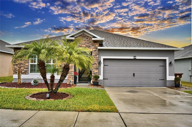 view of front of property with a garage