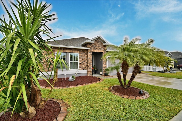 view of front of house with a front lawn