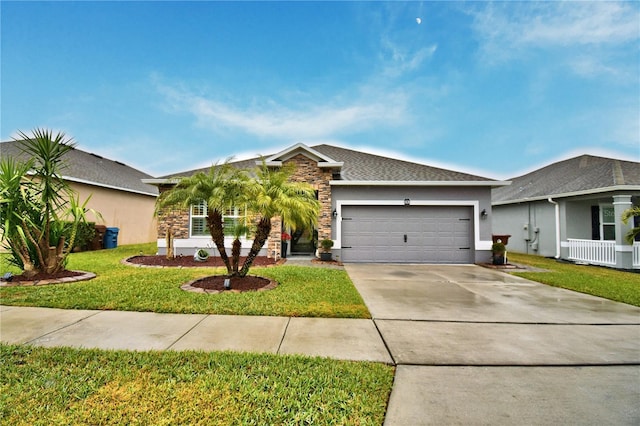 single story home with a garage and a front yard