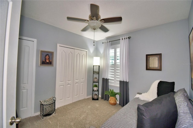 carpeted bedroom with ceiling fan