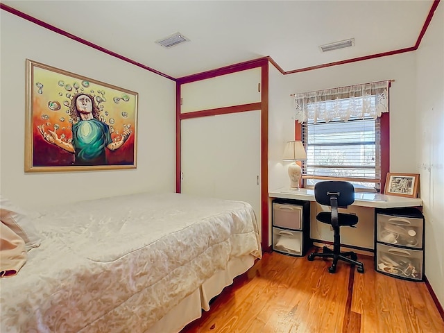 bedroom featuring light hardwood / wood-style flooring