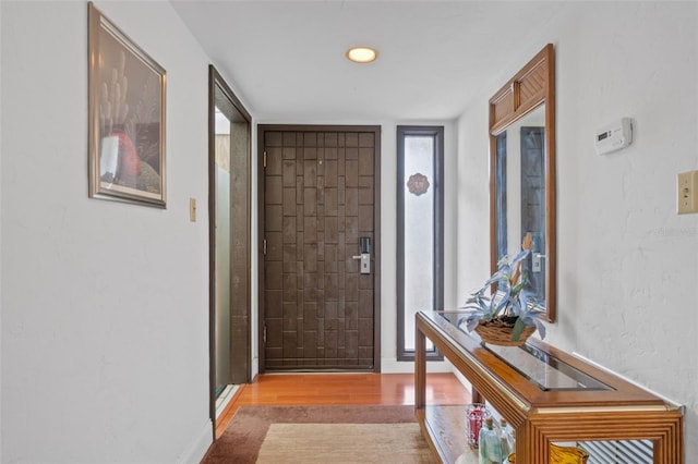 doorway featuring light hardwood / wood-style flooring