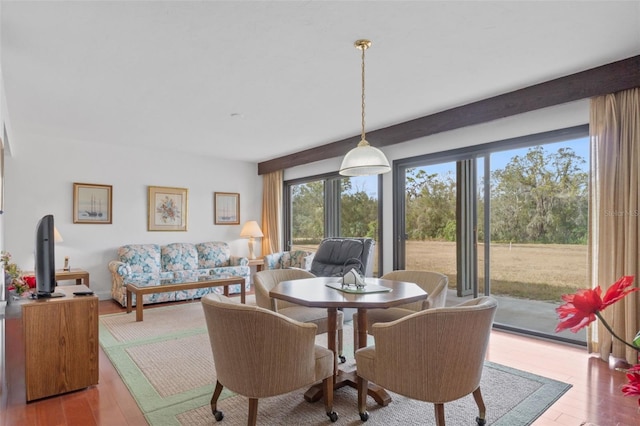 dining area with light wood-type flooring