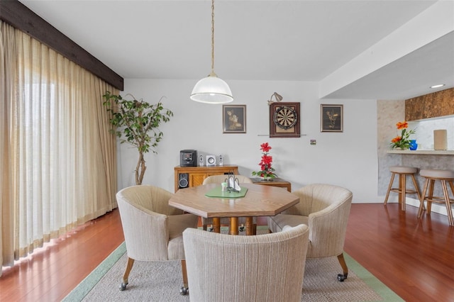 dining room with hardwood / wood-style floors