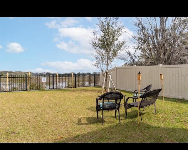 view of yard with a water view