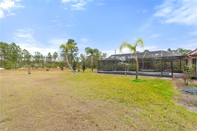 view of yard featuring a lanai