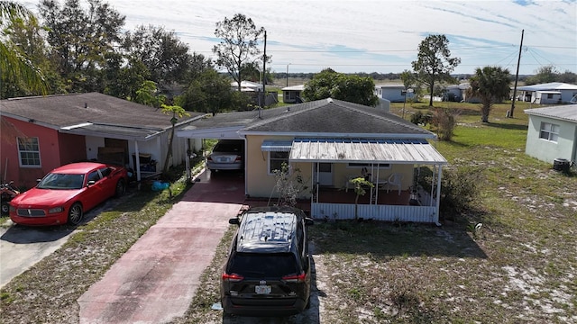 view of front of house with a front yard and a porch