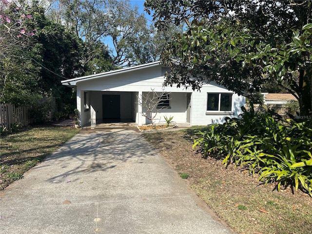 view of front facade featuring a carport