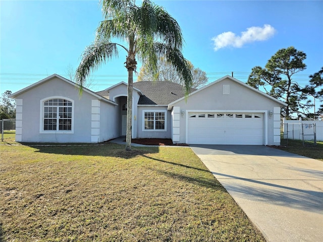 single story home with a garage and a front lawn