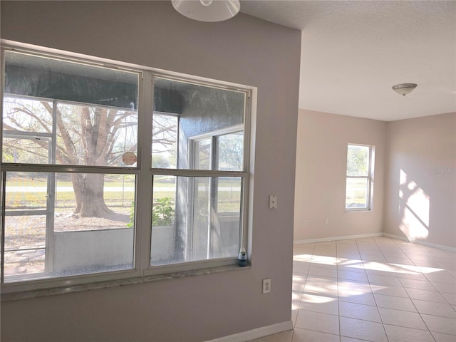 view of tiled empty room