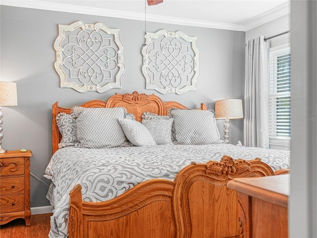 2002 Granada Ct Unit 1, Lake Wales, FL 33898 - bedroom with hardwood / wood-style flooring and crown molding
