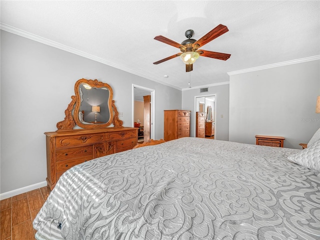 2002 Granada Ct Unit 1, Lake Wales, FL 33898 - bedroom featuring light wood-type flooring, crown molding, a textured ceiling, and ceiling fan