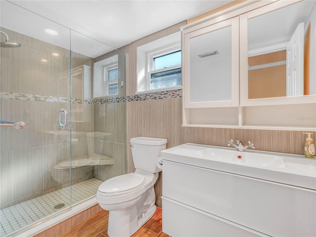 2002 Granada Ct Unit 1, Lake Wales, FL 33898 - bathroom with toilet, vanity, and a shower with shower door
