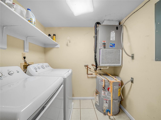 2002 Granada Ct Unit 1, Lake Wales, FL 33898 - washroom with washing machine and dryer, water heater, and light tile patterned floors