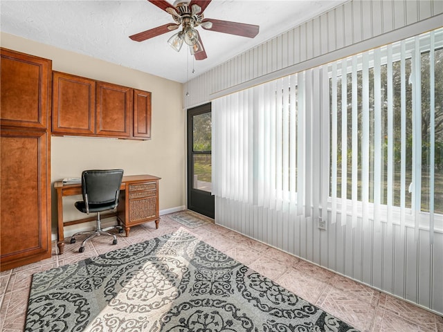 2002 Granada Ct Unit 1, Lake Wales, FL 33898 - office featuring a textured ceiling, ceiling fan, and light tile patterned floors