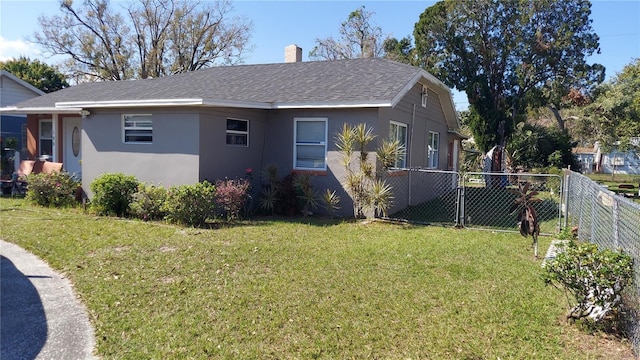 view of home's exterior featuring a lawn