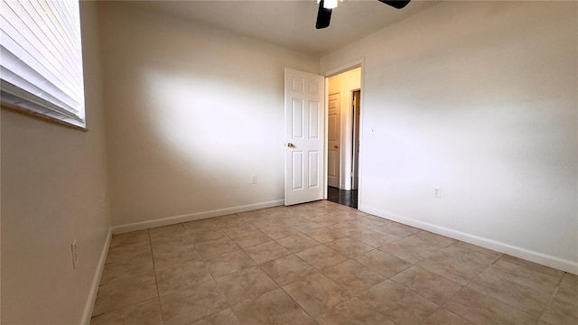 unfurnished room featuring ceiling fan