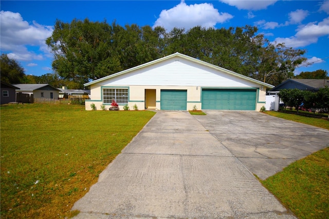 ranch-style home with a garage and a front yard