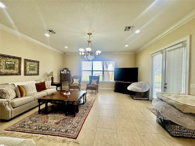 living room featuring an inviting chandelier, light tile patterned floors, ornamental molding, and a textured ceiling