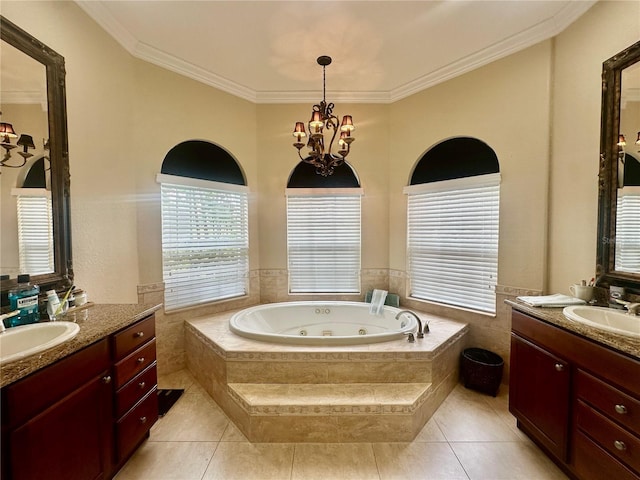 bathroom featuring an inviting chandelier, ornamental molding, tiled bath, and vanity