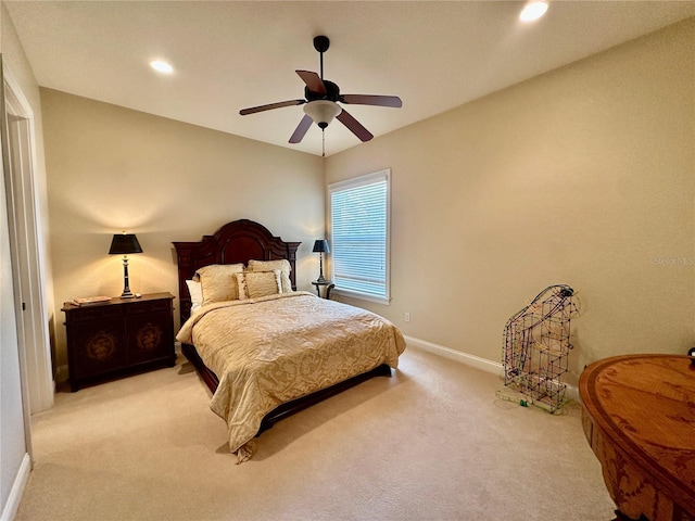 carpeted bedroom with ceiling fan