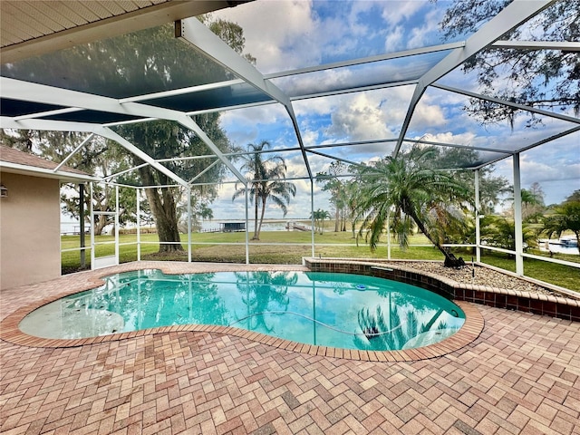 view of pool featuring a lanai and a patio area