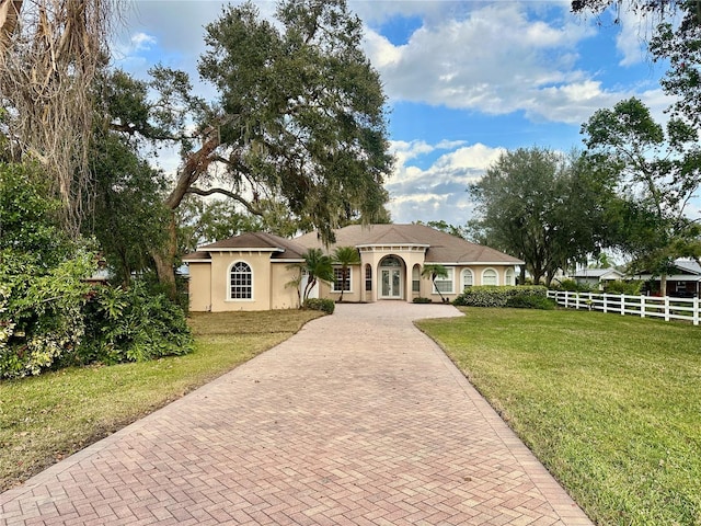 view of front of home with a front yard