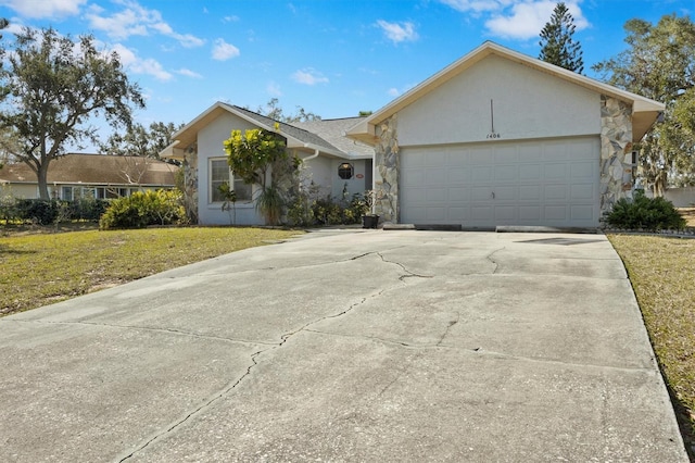 ranch-style home with a garage and a front yard