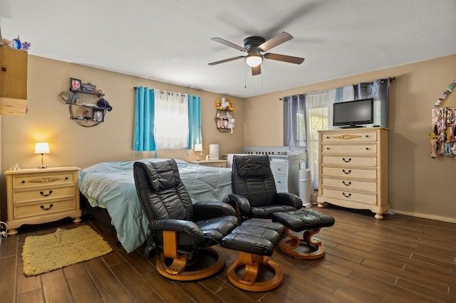 bedroom featuring dark wood-type flooring and ceiling fan