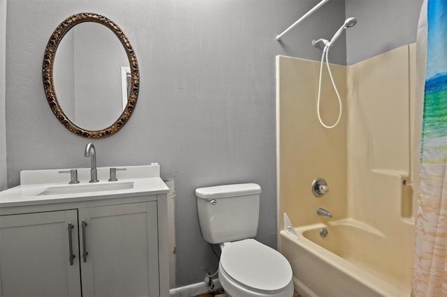 full bathroom with shower / tub combo, vanity, and toilet