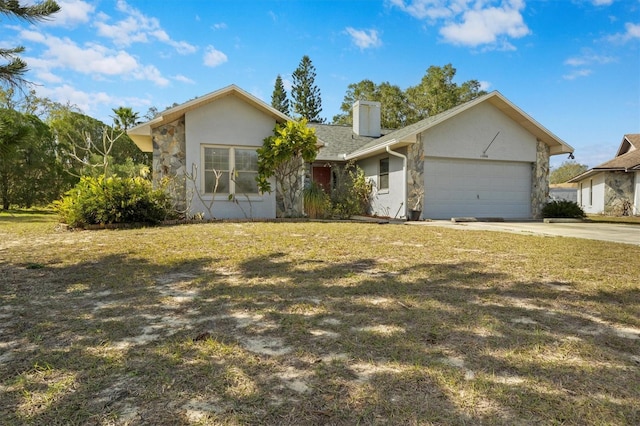 single story home with a garage and a front yard