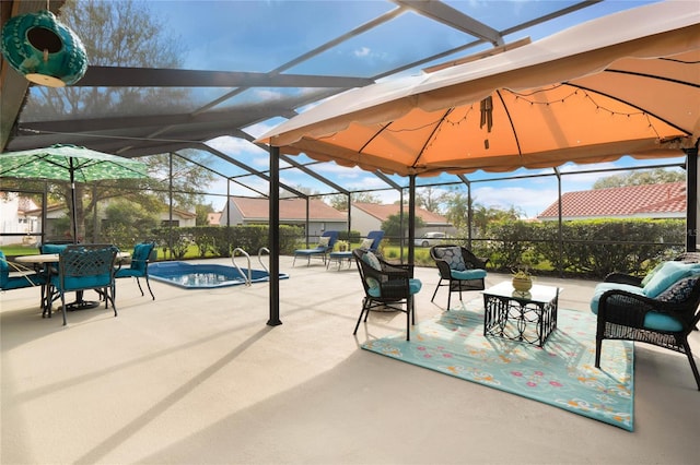 view of patio / terrace with a lanai and a fenced in pool