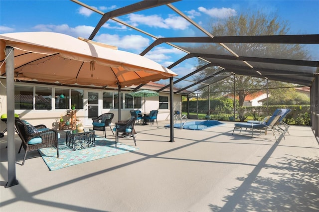 view of patio / terrace with glass enclosure