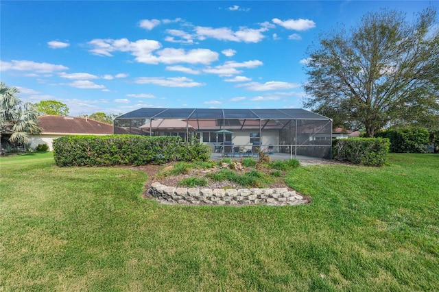 view of yard featuring a lanai