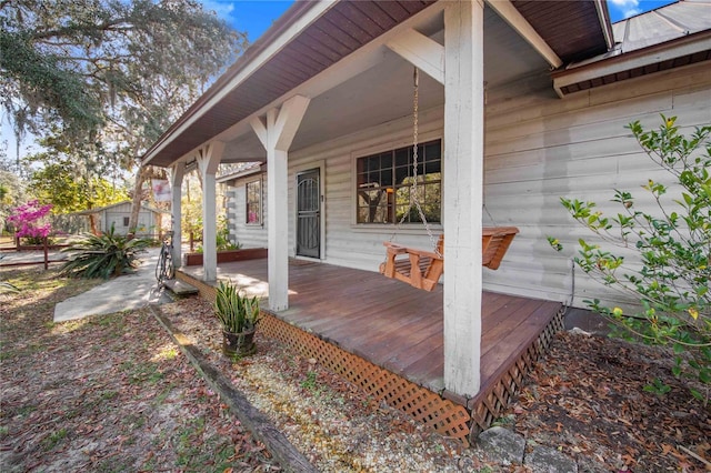 wooden terrace with covered porch