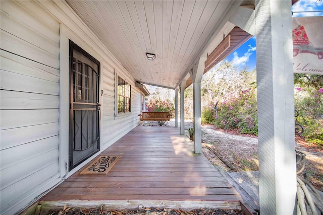 deck with covered porch