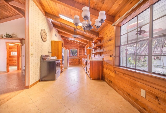 kitchen with lofted ceiling with beams, electric range, light tile patterned flooring, and wood ceiling