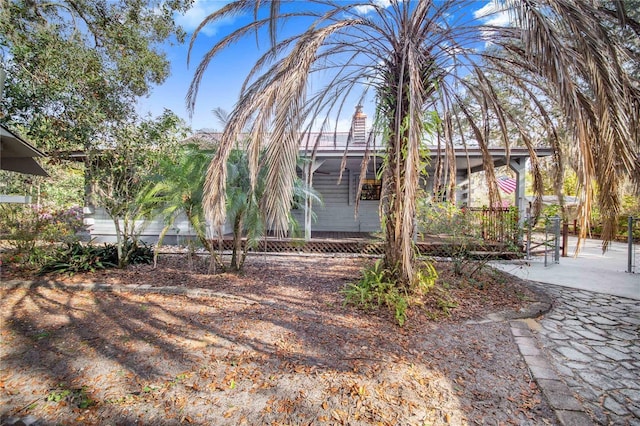 view of property exterior with a patio